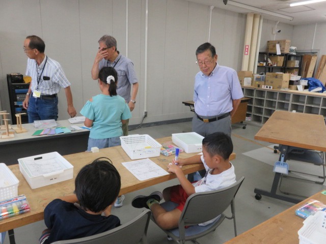 現在も相談役として、子供たちに温かく指導を行っている。